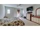 Spacious main bedroom with white walls and carpet, featuring a walkout balcony that provides plenty of natural light at 7645 Interlace St, Las Vegas, NV 89149