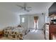 Serene main bedroom with balcony access, light walls and carpet, and ample space, offering a comfortable and private retreat at 7645 Interlace St, Las Vegas, NV 89149