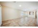 Spacious living room with tile flooring and lots of natural light at 7957 Fantail Dr, North Las Vegas, NV 89084