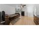 Bedroom with hardwood floors, modern furniture, and lots of natural light at 823 Schooner Dr, Henderson, NV 89015
