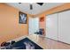 Bedroom featuring hardwood floors, closet and a neutral paint scheme at 823 Schooner Dr, Henderson, NV 89015
