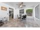 Dining area with a modern table set and natural light from the window at 823 Schooner Dr, Henderson, NV 89015