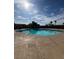 Community swimming pool offers a refreshing escape, complete with clear blue water, concrete surround, and blue sky at 823 Schooner Dr, Henderson, NV 89015