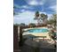 Community pool view with palm trees, blue skies, and lounge seating for relaxing and enjoying sunny days at 823 Schooner Dr, Henderson, NV 89015