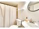Relaxing bathroom with a shower curtain, modern vanity, and plenty of natural light at 864 E Eldorado Ln, Las Vegas, NV 89123