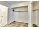 Spacious walk-in closet with shelving, rod for hangers, and a doorway to bathroom at 864 E Eldorado Ln, Las Vegas, NV 89123