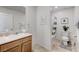 Functional bathroom with a single sink vanity, toilet, and shower over tub at 8786 Sand Verbena Ave, Las Vegas, NV 89117