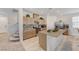Modern kitchen featuring stainless steel appliances, granite countertops, and center island with sink at 8786 Sand Verbena Ave, Las Vegas, NV 89117