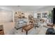 Bright living space with an open layout, neutral furniture, stylish decor, and lots of natural light at 8786 Sand Verbena Ave, Las Vegas, NV 89117