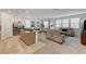 Spacious living room featuring neutral tones, lots of natural light, modern furniture and an open floor plan at 8786 Sand Verbena Ave, Las Vegas, NV 89117