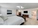 Bright main bedroom featuring a dresser and television for relaxation at 8786 Sand Verbena Ave, Las Vegas, NV 89117