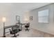 Bright office space features a well-lit workstation and minimalist decor at 8786 Sand Verbena Ave, Las Vegas, NV 89117