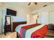 A large bedroom shows closet and dresser space and a ceiling fan to keep it cool at 9024 Starmount Dr, Las Vegas, NV 89134