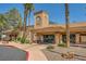Inviting fitness center exterior with easy access, beautiful landscaping, and shaded benches at 9024 Starmount Dr, Las Vegas, NV 89134