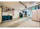 Organized garage with cabinets and storage solutions, offering a clean and functional space at 9024 Starmount Dr, Las Vegas, NV 89134