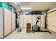 Functional garage featuring ample storage, with cabinets for your belongings and a place for exercising at 9024 Starmount Dr, Las Vegas, NV 89134