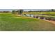 Expansive golf course with lush green fairways, water features, and mature trees at 9024 Starmount Dr, Las Vegas, NV 89134