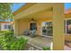 Charming covered patio with comfortable seating, perfect for outdoor relaxation and entertaining at 9024 Starmount Dr, Las Vegas, NV 89134