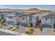 Eye-level aerial view shows new home construction with desert mountain view at 9876 Magnus Ct, Las Vegas, NV 89178