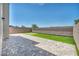 Wide patio with artificial turf landscaping and a putting green at 9876 Magnus Ct, Las Vegas, NV 89178