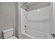 Clean white bathroom with a tub at 9876 Magnus Ct, Las Vegas, NV 89178