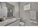 Bathroom with a window and granite countertop at 9876 Magnus Ct, Las Vegas, NV 89178