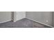 Bedroom with neutral carpet, paint, and white baseboards at 9876 Magnus Ct, Las Vegas, NV 89178