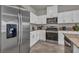 Kitchen with stainless steel appliances, granite countertops, and white cabinets at 9876 Magnus Ct, Las Vegas, NV 89178