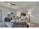 Cozy living room with modern furniture, stylish decor, and ample natural light at 9876 Magnus Ct, Las Vegas, NV 89178