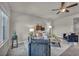 Bright living room with neutral tones, stylish furniture, and ample natural light at 9876 Magnus Ct, Las Vegas, NV 89178