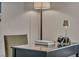 Cozy office nook with a sleek black desk, chair, and stylish lighting for a functional workspace at 9876 Magnus Ct, Las Vegas, NV 89178