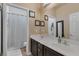 Bathroom featuring a double sink vanity and a separate toilet and shower at 10212 Cider Mill Rd, Las Vegas, NV 89135