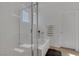 Bright bathroom featuring a soaking tub and a separate tiled shower with glass enclosure at 10212 Cider Mill Rd, Las Vegas, NV 89135