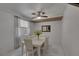 Charming dining room featuring a ceiling fan, bright decor and natural lighting at 10212 Cider Mill Rd, Las Vegas, NV 89135