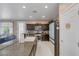 Well-equipped kitchen with dark cabinetry, stainless steel appliances, and stone countertops at 10212 Cider Mill Rd, Las Vegas, NV 89135