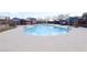 Community pool featuring a unique circular design with plenty of space for relaxation at 10212 Cider Mill Rd, Las Vegas, NV 89135