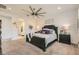 Cozy bedroom with neutral tones, a large bed, and stylish decor for a relaxing atmosphere at 10456 Skye Arroyo Ave, Las Vegas, NV 89166