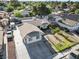 This aerial view captures the serene setting of the property within a quiet, tree-lined neighborhood at 1105 Declaration Dr, Las Vegas, NV 89110