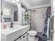 Updated bathroom features stylish sink, vanity, and modern shower with marble-style tile at 1105 Declaration Dr, Las Vegas, NV 89110