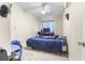 Comfortable bedroom with a ceiling fan and carpeted floors for a cozy feel at 1105 Declaration Dr, Las Vegas, NV 89110