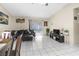 Open living area with tile floors and natural light from sliding glass door to backyard at 1105 Declaration Dr, Las Vegas, NV 89110