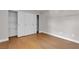 Hardwood bedroom with a sliding door closet offers a spacious layout and storage, perfect for comfortable living at 1150 N Buffalo Dr # 2025, Las Vegas, NV 89128