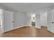 This well-lit bedroom features hardwood floors and neutral walls for a comfortable and stylish living space at 1150 N Buffalo Dr # 2025, Las Vegas, NV 89128