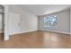 Bright bedroom with large window and hardwood flooring at 1150 N Buffalo Dr # 2025, Las Vegas, NV 89128