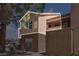 Exterior view of a building with balconies and view of a parking area at 1150 N Buffalo Dr # 2025, Las Vegas, NV 89128