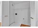 This laundry room features a washer/dryer hookup, storage, and utility connections for efficient laundry operations at 1150 N Buffalo Dr # 2025, Las Vegas, NV 89128