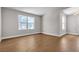 Open concept living room offers sleek hardwood floors and plenty of natural light at 1150 N Buffalo Dr # 2025, Las Vegas, NV 89128