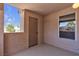 This secluded outdoor patio features stucco walls, offering a private retreat for relaxing or entertaining outdoors at 1150 N Buffalo Dr # 2025, Las Vegas, NV 89128