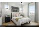 Bright, primary bedroom with decorative lighting, and light-colored furnishings with modern decor at 121 Piano Ln # Lot 198, Henderson, NV 89015