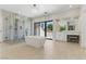 This bright bathroom features a freestanding tub, frameless glass shower, and sliding glass door at 13 Dovetail Cir, Henderson, NV 89014